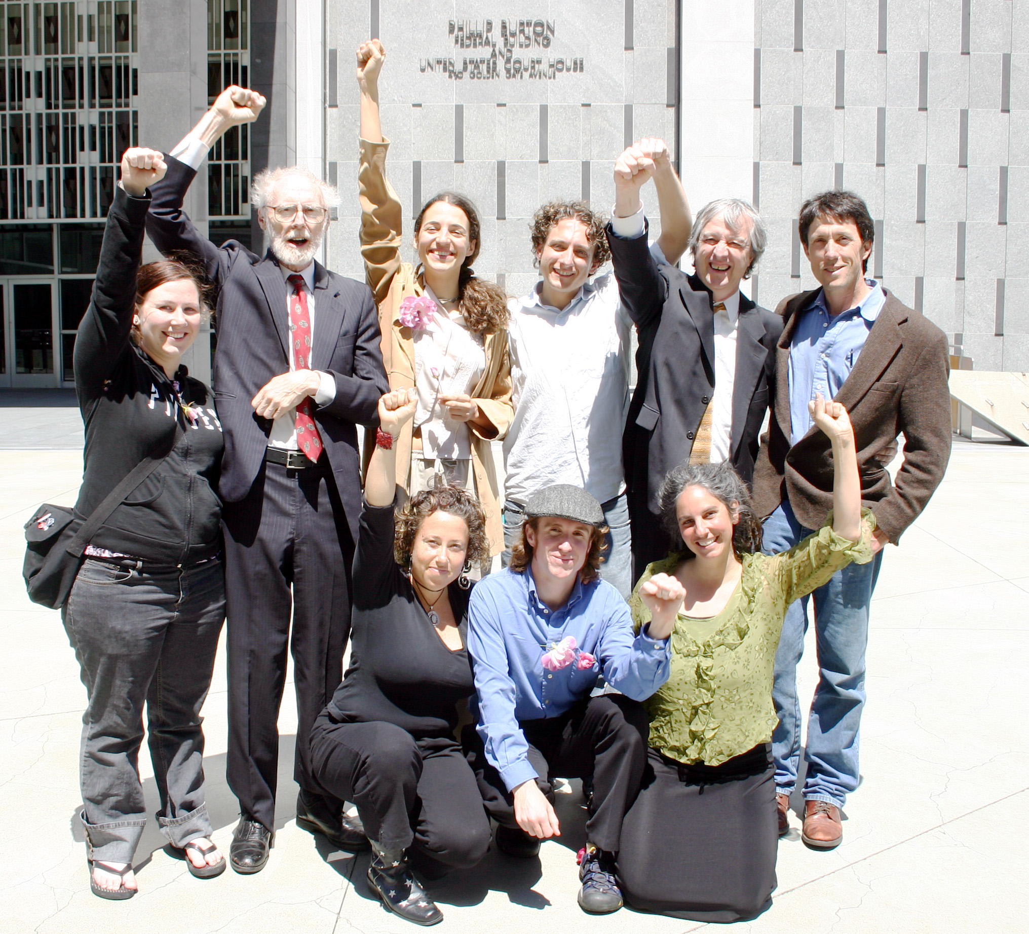 Plaintiffs and lawyers at their victory press conference